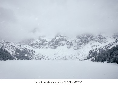 Winter View Of Morskie Oko. Zakopane Poland During Severe Snowfall.