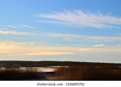Winter view on a lake and blue sky above. Selective focus. High quality photo
