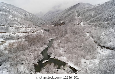 Winter View From Rodopi Mountain In Bulgaria With River