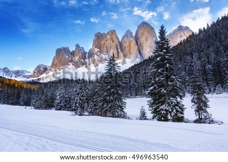 Winter views of the Geisler or Odle Dolomites mountain peaks in the Val di Funes (Villnosstal) in Italy. The surroundings of the village Santa Maddalena.