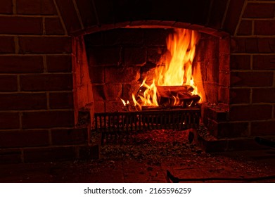 Winter warmth, an open fire burns brightly