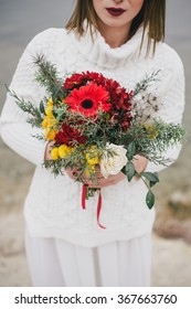 Winter Wedding. Beautiful Young Bride Posing Near Lake