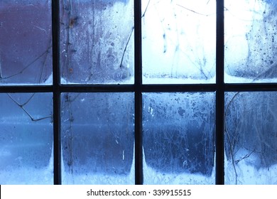 Winter Window, Drops Of Water And Snowflakes On A Window Pane.