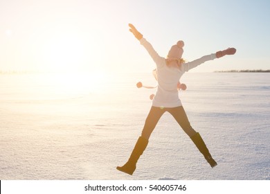 Winter Women Jump In Snow. Sunny Weather. French Style. Outdoor Shot. Beauty Girl In Hat And Scarf.