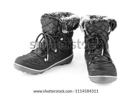 winter women's boots snowmobiles with fur isolated on white background
