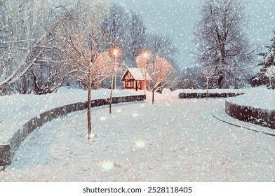 Winter wonderland landscape. Winter night landscape, small house among the snowy trees in the night. Winter landscape with snowflakes - Powered by Shutterstock