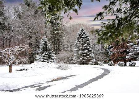 Winter wonderland in New England. Tranquil and beautiful late afternoon wintery scene in Littleton, Massachusetts.