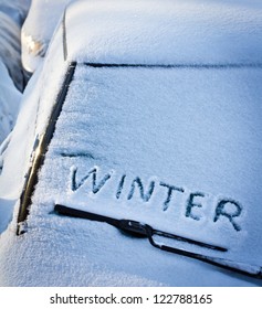 Winter Written In Snow On Car Windscreen Below Windscreen Wiper