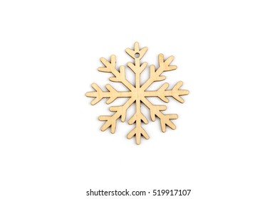 Winter,Christmas, New Year wooden decoration - snowflake, star. Isolated on white background. Top view. Closeup. - Powered by Shutterstock