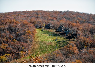 Wintergreen, USA Ski Resort Town Village In Blue Ridge Mountains In Autumn Fall Winter With Slope And Orange Foliage On Trees Mountain Peak