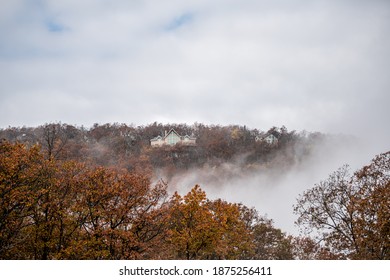 Wintergreen, USA Ski Resort Town In Blue Ridge Mountains In Autumn Fall With Mist Fog Clouds And Orange Foliage On Trees Mountain Peak