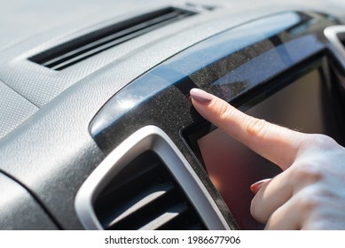 Wipe Dust Off Car Dashboard With Finger.