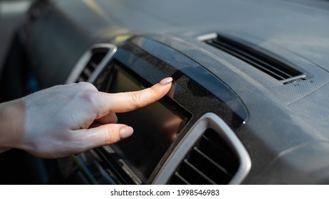 Wipe Dust Off Car Dashboard With Finger.