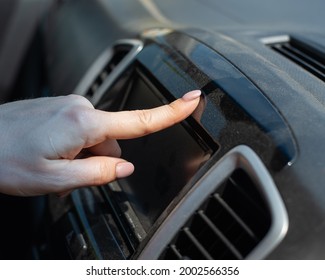 Wipe Dust Off Car Dashboard With Finger.