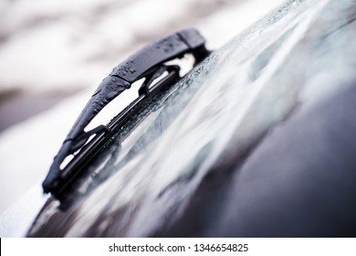 Wiper Blade With Shallow Depth Of Field And Wet Car Window