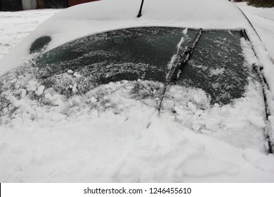 Wiper Blades Clean The Car's Windshield From Snow - Winter, Snowstorm Icing Vehicle After Snowfall, Safe Winter Driving, Preparing For The Trip