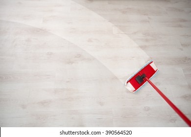 Wiping Floor During Spring Cleaning 