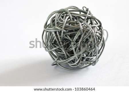 wire ball on white background - Depth of field close up photo