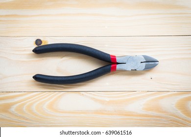 Wire cutter and wire cutter on wooden floor