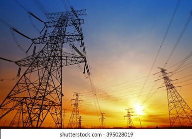 Wire electrical energy at sunset  - Shutterstock ID 395028019