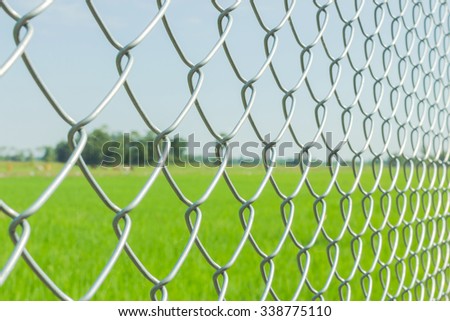 Wire fence closeup, select focus