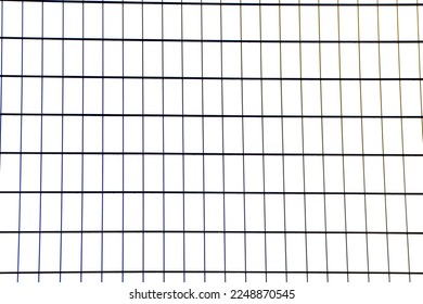 Wire mesh fence isolated on white background bottom to top view where the fence is placed on the hill