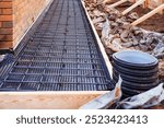 Wire mesh piles for construction. BRC welded steel wire mesh for concrete slab reinforcement of construction construction site, foundation reinforcement