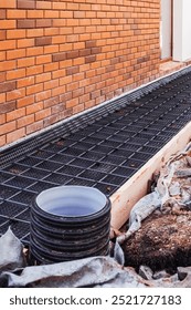Wire mesh piles for construction. BRC welded steel wire mesh for concrete slab reinforcement of construction construction site, foundation reinforcement