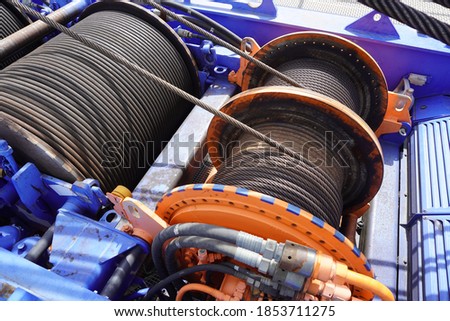 Wire rope sling or cable sling on crane reel drum or winch roll of crane the lifting machine in heavy industrialใ