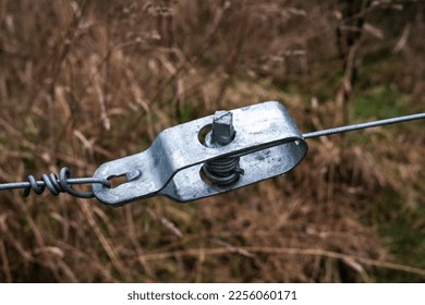 Wire tensioner for a fence - Shutterstock ID 2256060171