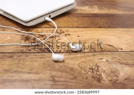 wired earphones connected to a device