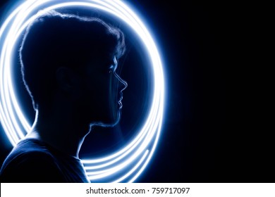 Wireframe human profile face portrait blue  technological background  Circle light painting  Man silhouette