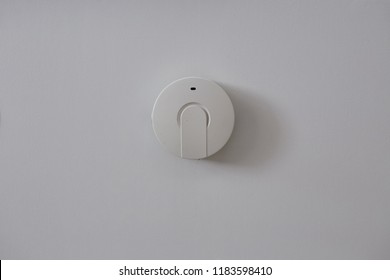 Wireless Access Point Installed On The Ceiling For Connect Internet. Wifi Repeater Devices Isolated On White Wall.