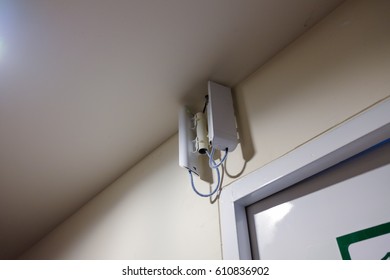 Wireless Access Point And Wall Mount On Wall Of Building