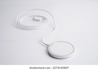 Wireless charger, magnetic charging modern equipment of mobile phone. - Shutterstock ID 2274145829