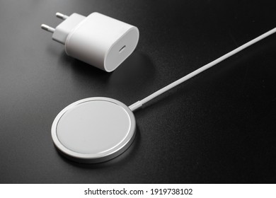 wireless charger on black background.magnetic charging