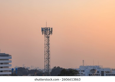 Wireless Communication Antenna pole, Mobile phone mast antenna pole on top of dilapidated building