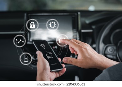 Wireless Connection Technology In The Smart Car And Virtual Screens Concept, Man Use The Smartphone  Online To A Car ,Connecting To The Car System And Safety Technology,car Inside Background