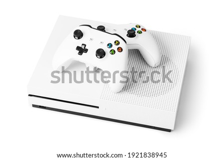 Wireless gamepads and game console isolated on white background