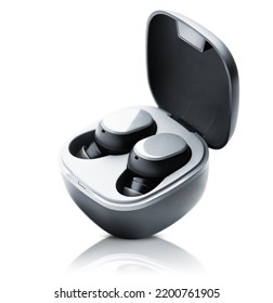wireless headphones in a case on a white isolated background - Shutterstock ID 2200761905