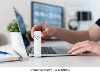 Wireless Internet Concept. Man Using Mobile Network Expander Or Mobile Internet Modem USB Stick