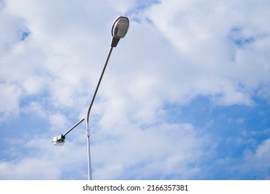 Wireless lamps pole on blue sky background that use for streetlight at night in Thailand. Use solar cell or photovoltaic energy for lighting.   