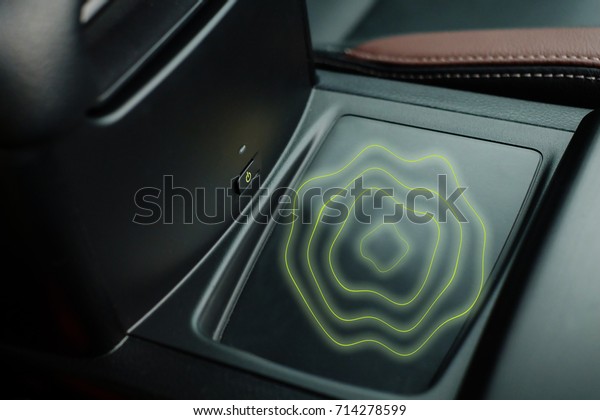 wireless mobile\
charger system in modern\
car.