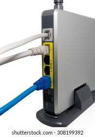 Wireless Modem Router With Cable Connected.wireless Router With Plugged Cables.Modern Wireless Router.High Speed Internet Connection, Computer Network And Telecommunication Technology Concept.