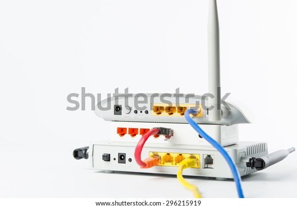 Wireless\
modem router network hub on white\
background