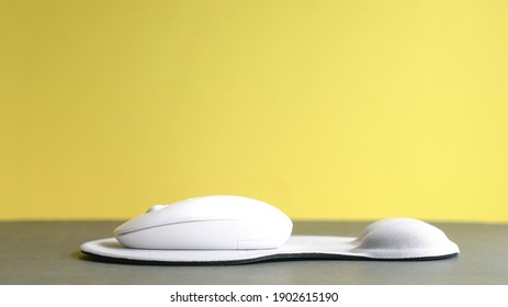 Wireless Mouse And Mouse Pad With Wrist Rest. Isolated.