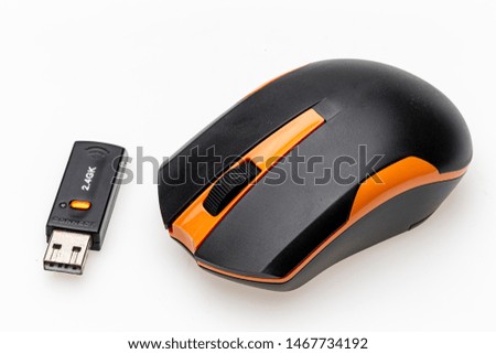 wireless mouse and USB dongle isolated on white background.