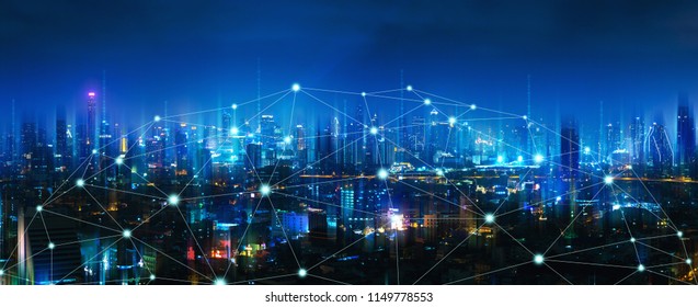 Wireless Network And Connection Technology Concept With Bangkok City Background At Night In Thailand, Panorama View