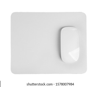 Wireless optical mouse and pad isolated on white, top view