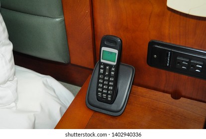 Wireless Phone In The Night Table Right Near The Bed.